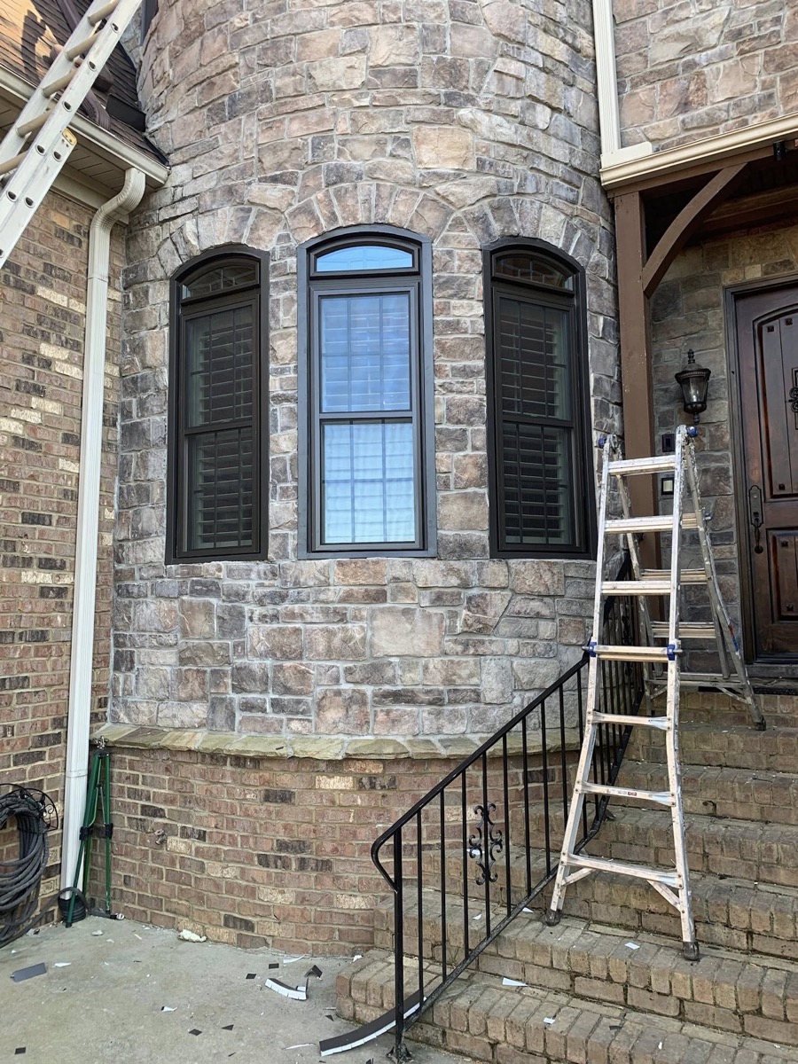 Window replacement on stone turret